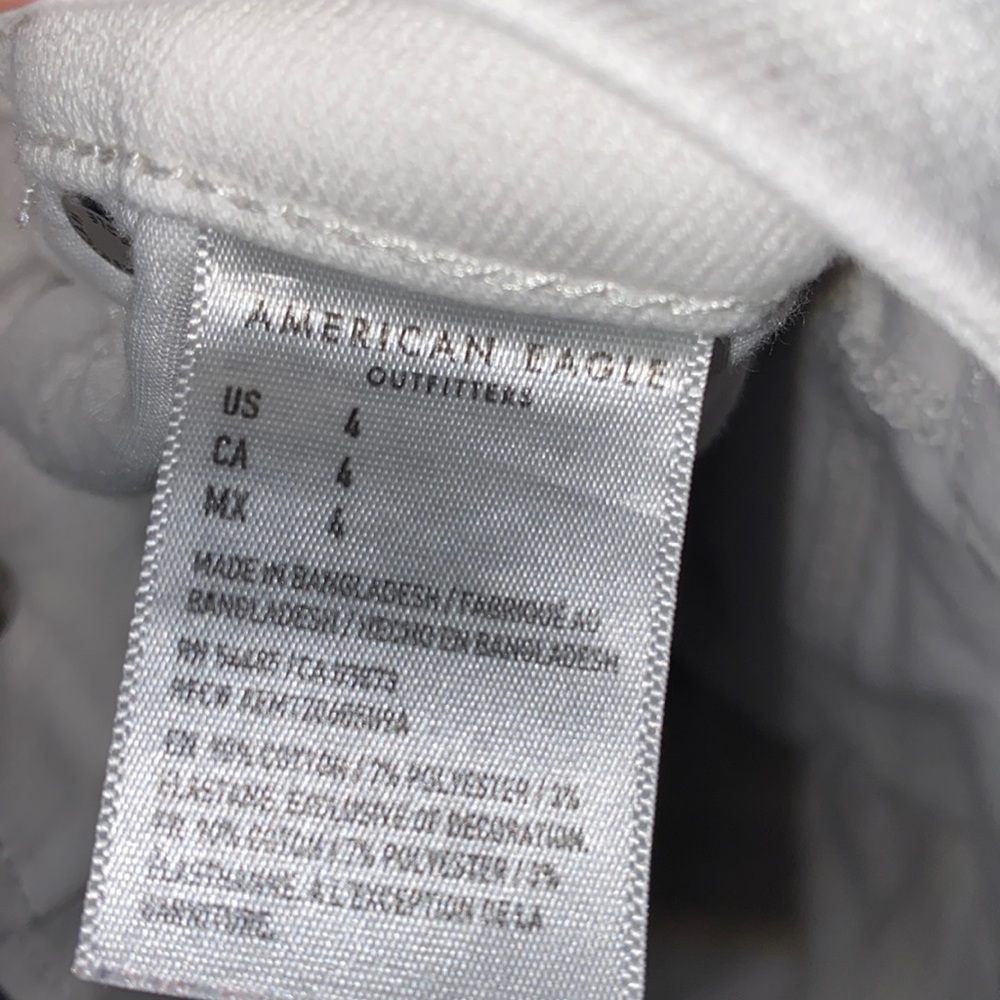 American Eagle super stretched white ripped shorts